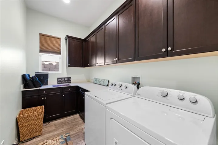 Great laundry room with plenty of storage