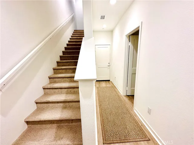 Stairway heading to 2nd floor