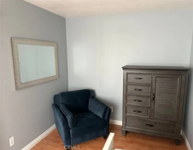 Bedroom 2 seating & dresser