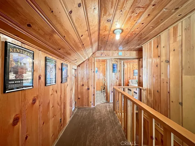 Log Cabin upstairs hallway to bedrooms.