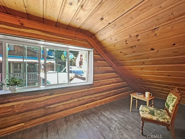 Log Cabin upper level landing and reading nook.