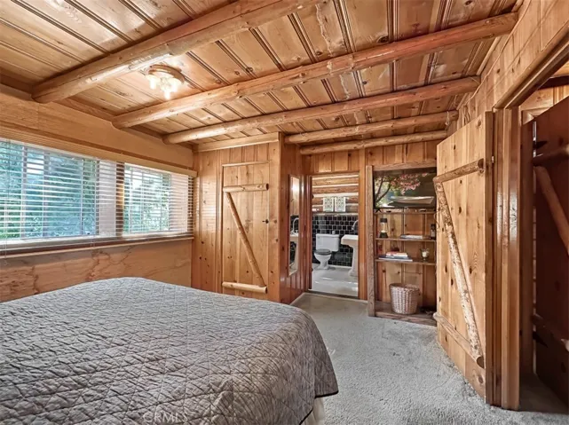 Log Cabin Primary Bedroom and En Suite.