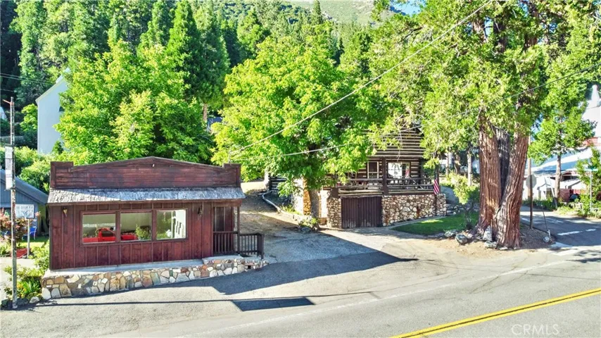 Commercial/Residential building and Log Cabin.