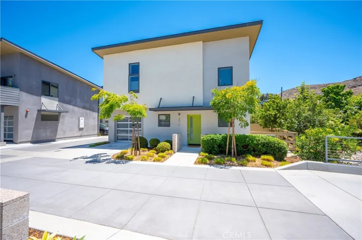 LIGHT & BRIGHT EXTERIOR PAINT AND A WELCOMING FRONT DOOR