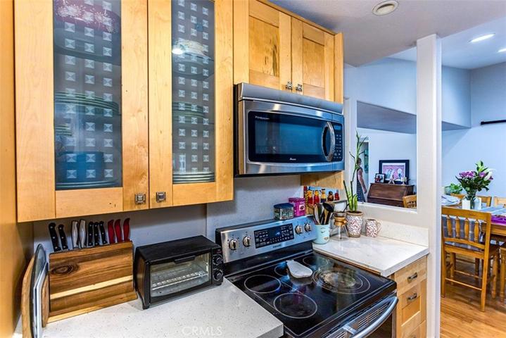 Upgraded kitchen cabinetry and quartz counters.