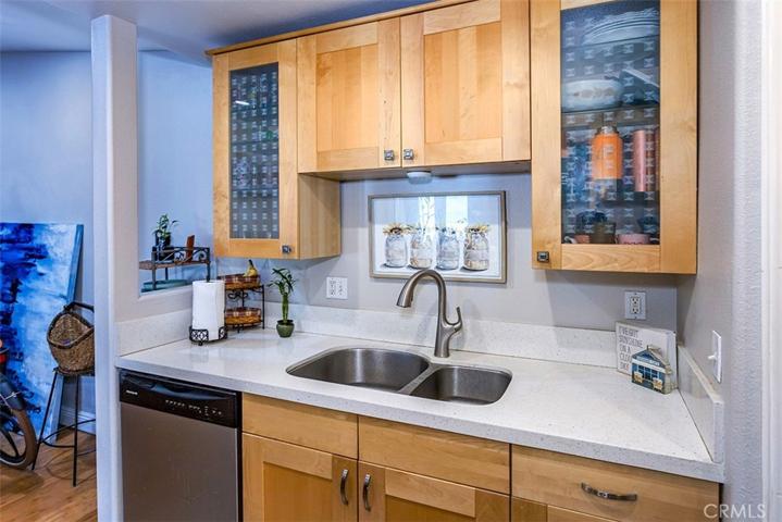 Lots of kitchen cabinet and storage areas.