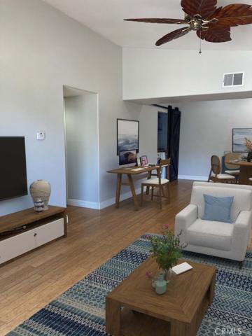 Virtual Staging Photo of Familt & Dining room.