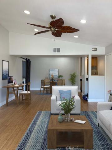 Virtual Staging Photo from Family Room to Dining Room.