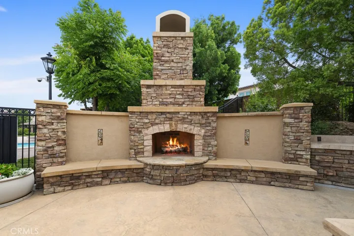 inside community clubhouse bbq & fireplace area