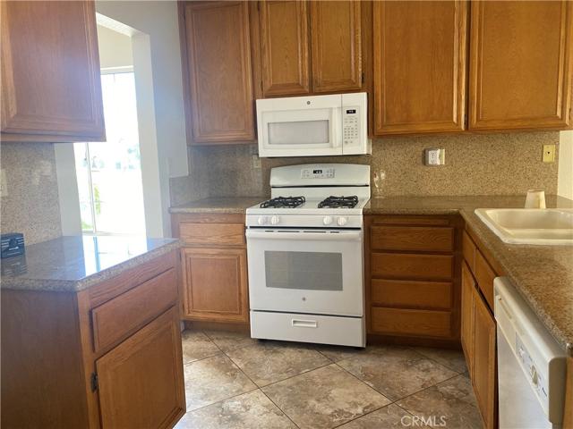 Kitchen showing doorway to dining area