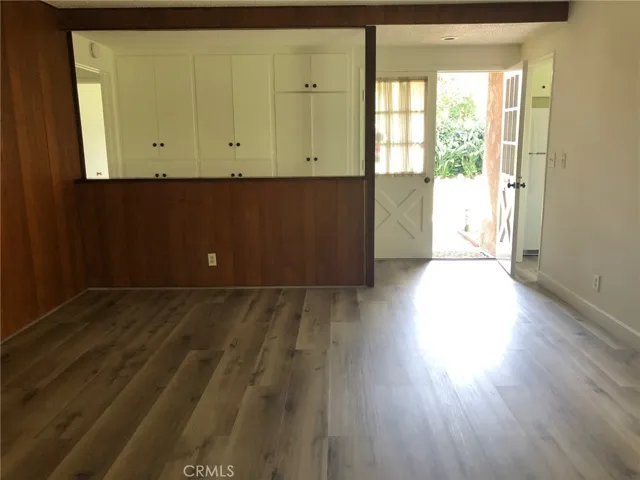 Living Room with tons of storage cabinets in hall