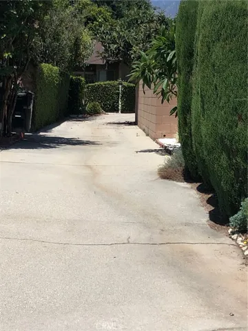 Located at the end or the driveway on flag lot