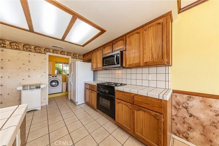 Kitchen looking to Laundry
