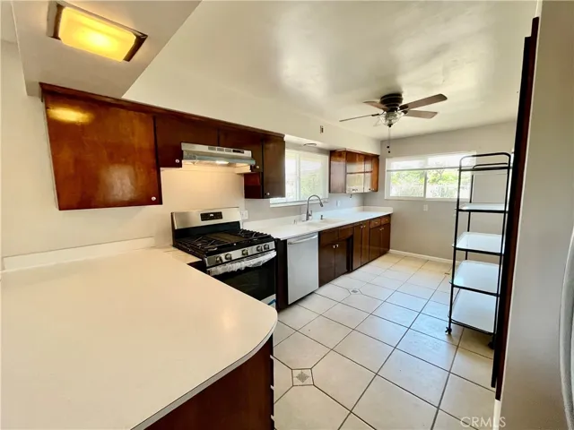 Light, bright kitchen with new stove.