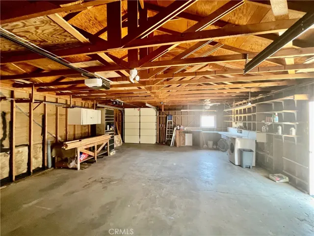 768 sq ft garage w/2 roll ups and bathroom.

