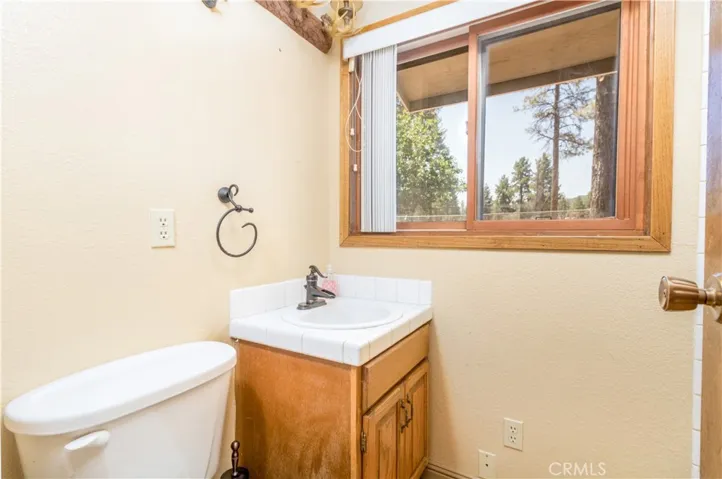 Very convenient downstairs bath off laundry room