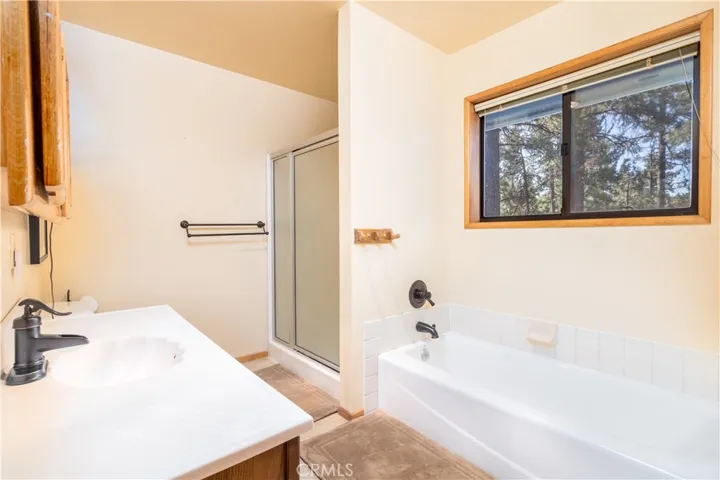 Upstairs bath to second living quarter