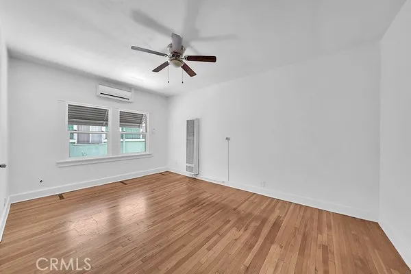 Living Room with Window and Ceiling Fan
