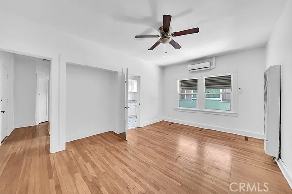 Living Room with Window and Ceiling Fan