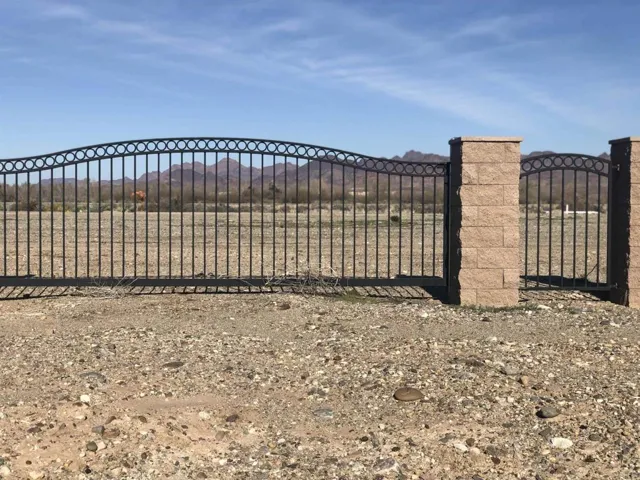 Front wall and gates to lot