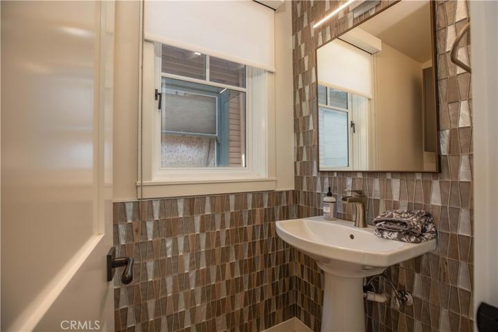1/2 bathroom located just off the kitchen.