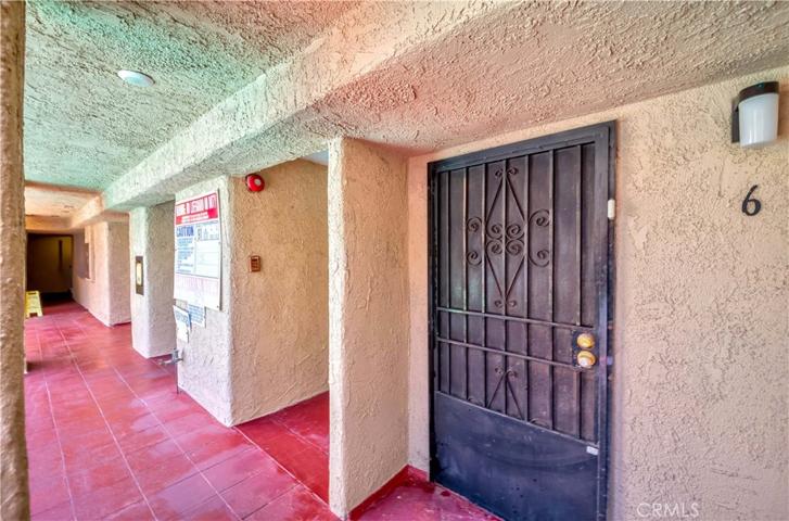 Hallway to the front door of the unit
