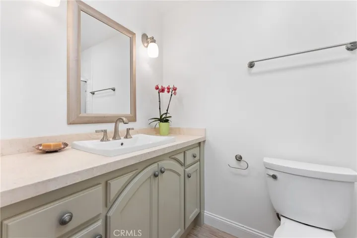 Style meets function in the beautiful upstairs/hallway bathroom.