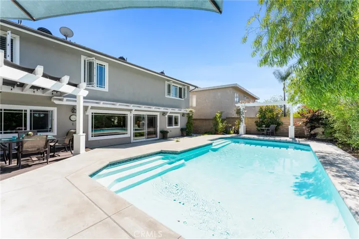 Host gatherings and BBQs in the spacious backyard.