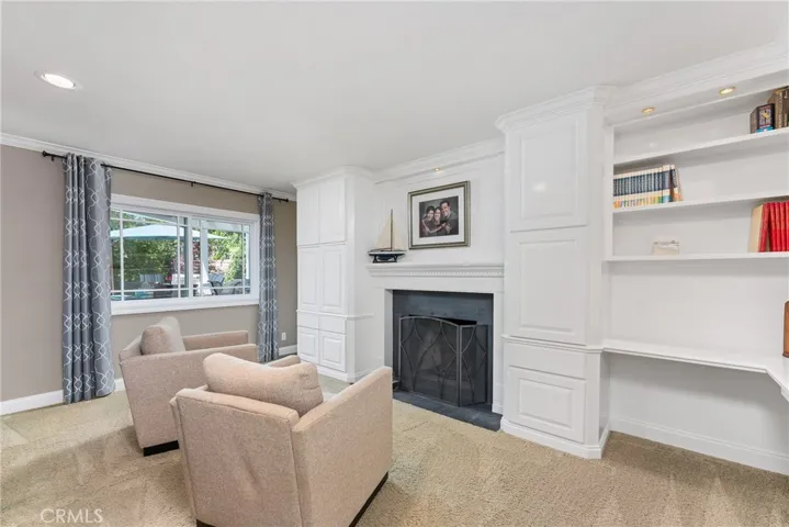 Versatile floor plan with a DOWNSTAIRS bedroom and fireplace.  Currently being used as a study.