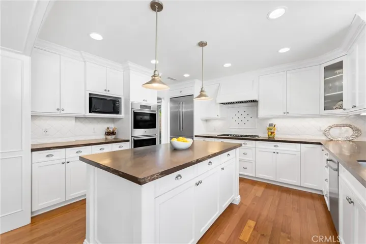 The kitchen is a chef's delight with a large center island.