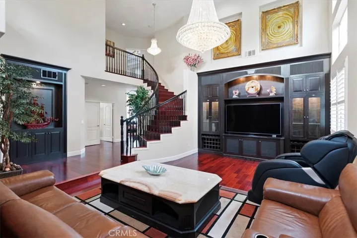 Living Room w/ Custom Built in Cabinets