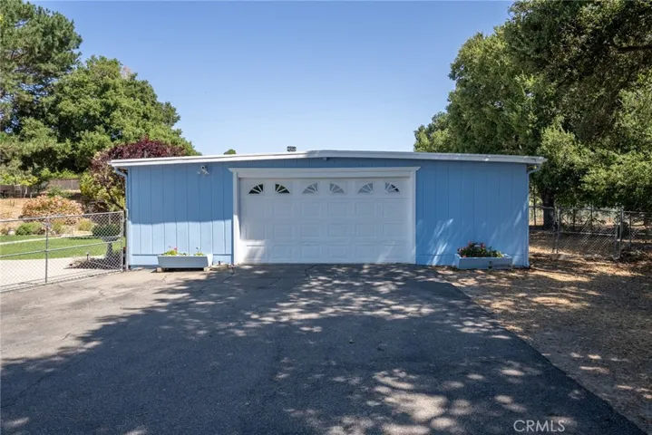 Oversized two car garage with automatic opener.
