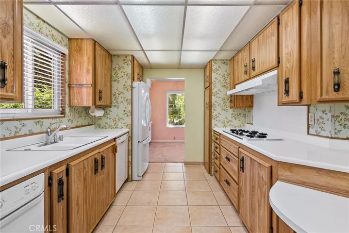 The roomy kitchen provides plenty of room for multiple people to be in the kitchen at the same time.