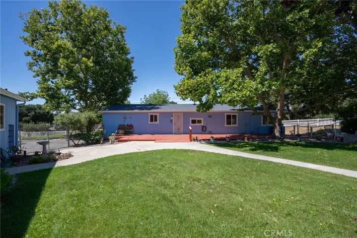 There is a huge deck that runs almost the entire length of the home.
