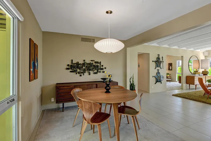DINING ANGLED TO LIVING AND DEN MLS