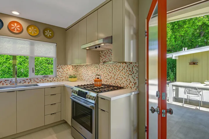 KITCHEN OUT TO ENTRY COURTYARD MLS