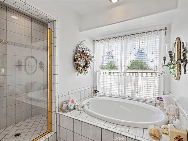 Separate walk in shower and soak tub
