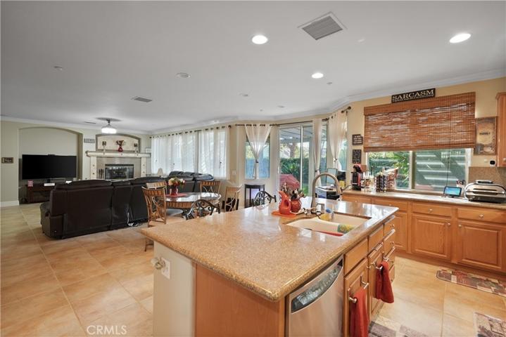 Kitchen, informal dinning room and family room view