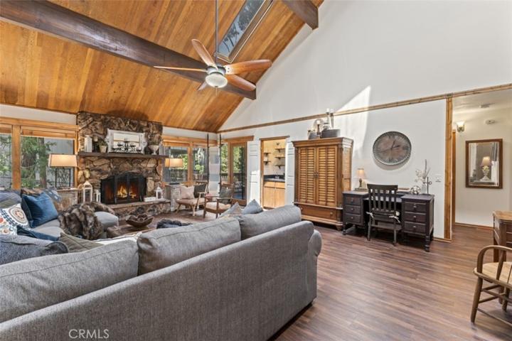 Spacious, with soaring tongue and groove, beamed ceilings