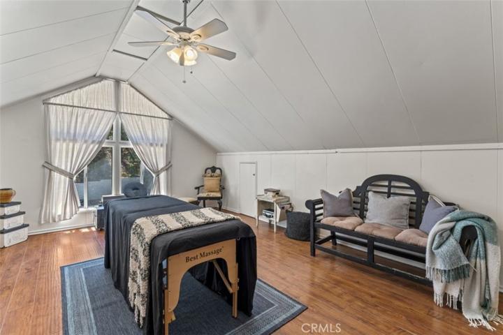 Upstairs you will find this spacious bedroom (3) currently used as a massage room