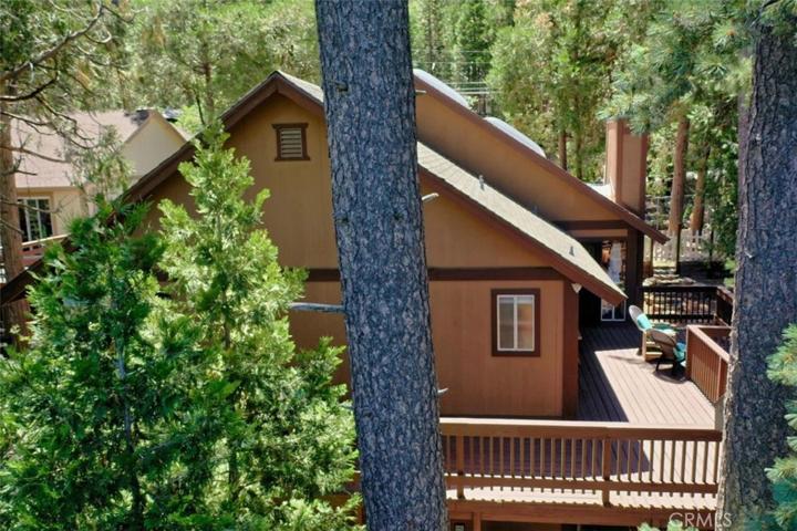 Incredible wraparound deck is private, expansive, accommodating a multitude of uses
