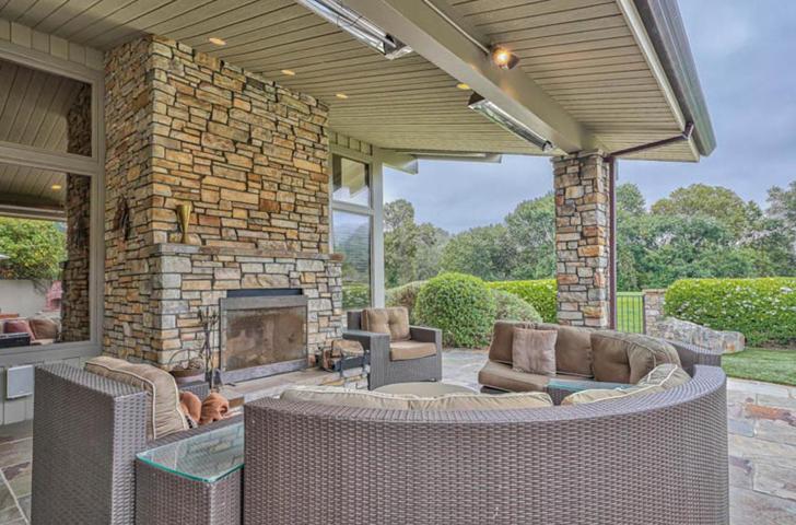 Back area with fireplace and heaters