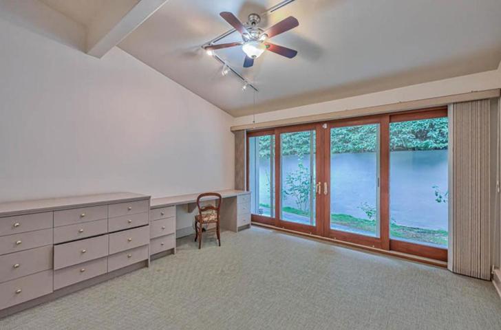 Bedroom with built in dresser