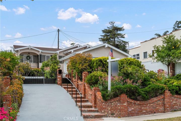 Lots of curb appeal and beautiful landscaping to welcome your guests