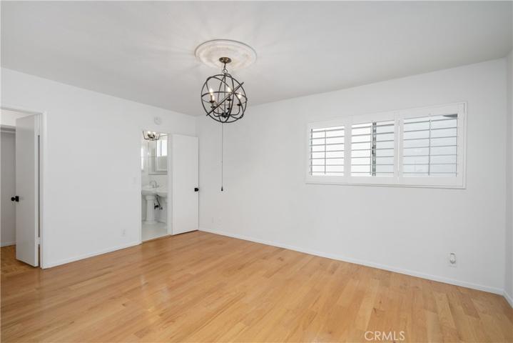 Primary bedroom with 3 closets: walk in plus 2 double hanging
