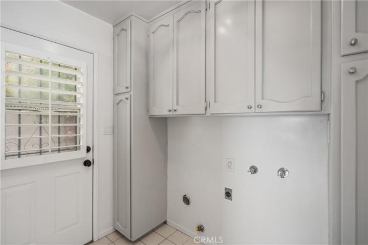 Pantry with washer and dryer hookups