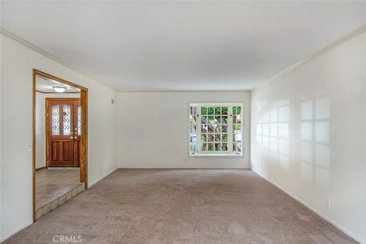 Light and spacious main living area with beautiful bay window to front yard