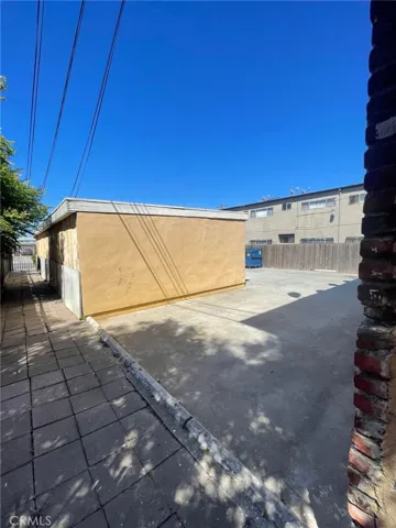 Facing The Carport & The Street
