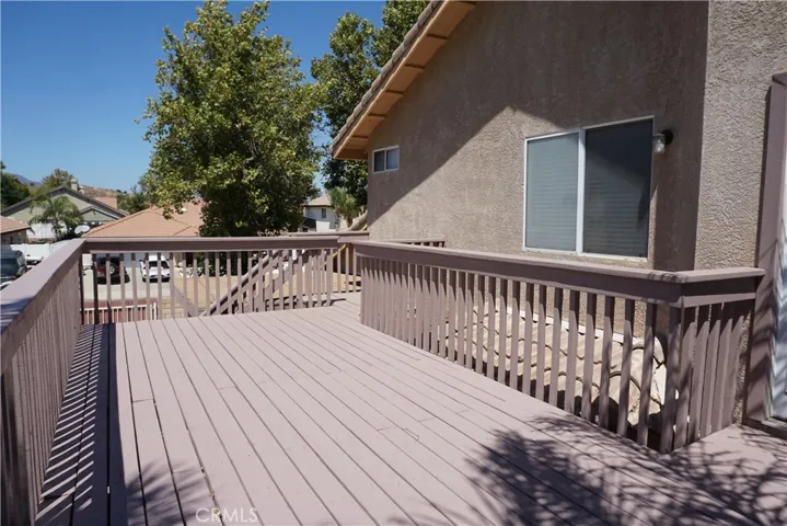 balcony with stairs to yard below