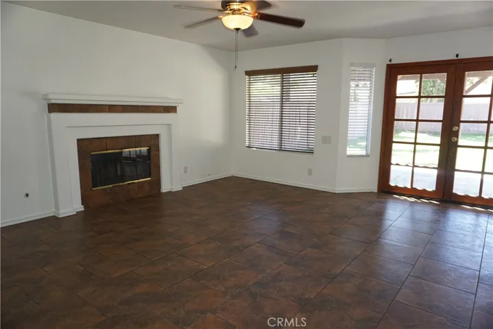 family room with french doors and fireplace